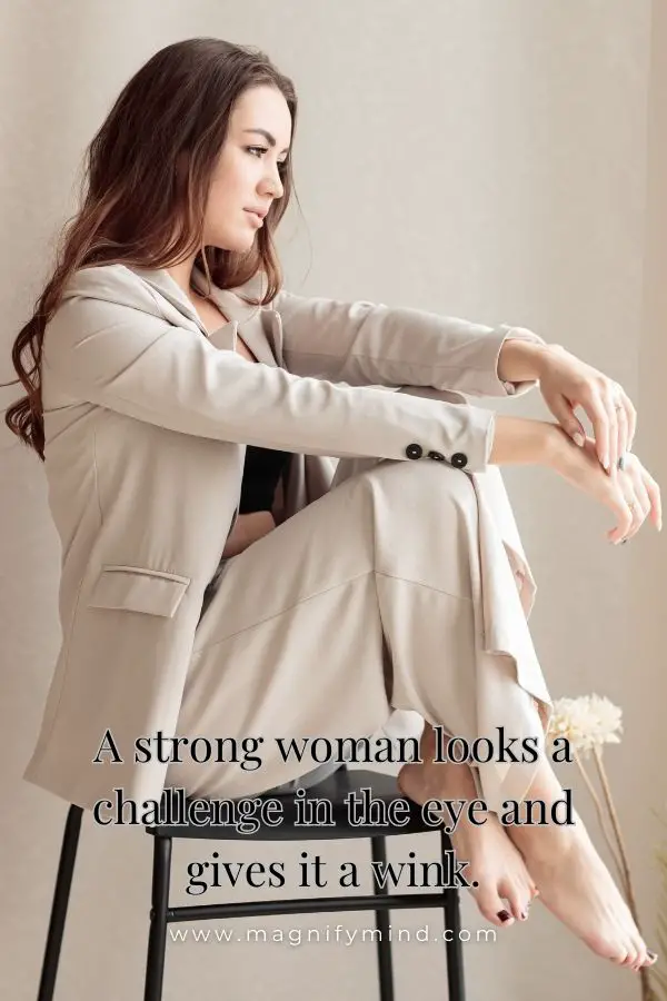 A strong woman looks a challenge in the eye and gives it a wink